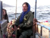 A Tunisian fisherwoman and her companion: the sea